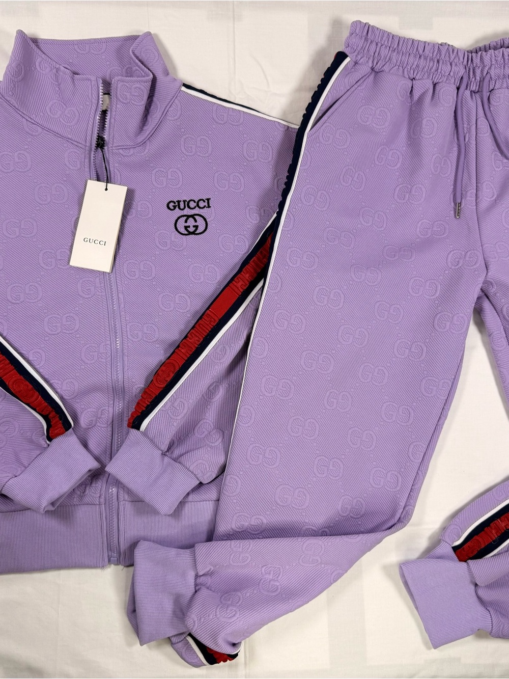 Gucci Lavender GG-Embossed Track Jumpsuit with Red-Blue Stripe